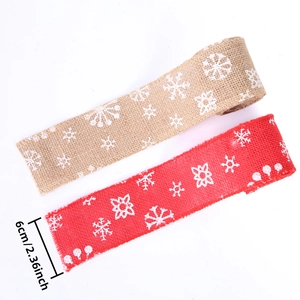 Faux burlap Christmas ribbon with snowflake prints in natural and red, 6cm wide
