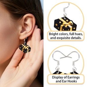 Creative black gift box earrings with golden bow print for New Year celebration
