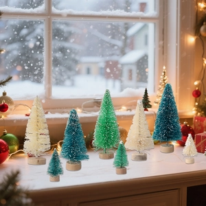 Eight mini frosted sisal Christmas trees in blue white and green on wood bases