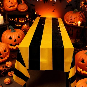 Detail of black and orange striped PET tablecloth for Halloween party decorations
