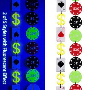 Casino party decorations with UV fluorescent poker cards and gambling chips hanging set