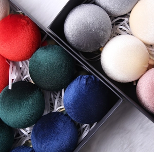 Velvet Christmas ball set in diverse colors displayed in a premium gift box