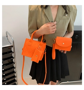 Three-piece set featuring orange felt tote with diamond stitching and matching pouches