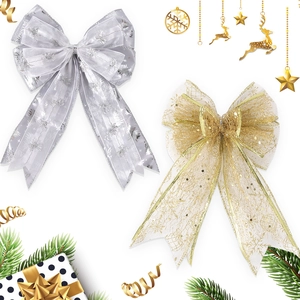 Sparkling gold mesh and silver snowflake Christmas bows for festive tree decoration
