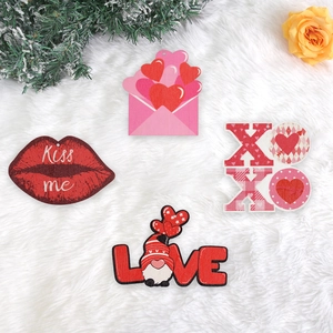 4-piece Valentine's Day wooden hanging ornaments with LOVE and XOXO festive designs