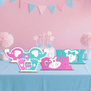 Gender reveal wooden table decor set with blue and pink boy or girl signs and elephant