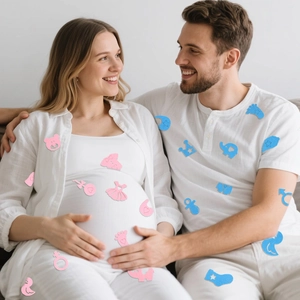 Felt baby gender reveal party decorations with blue and pink elephant and foot shapes