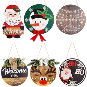 Set of six festive wooden Christmas door signs with reindeer and Santa designs