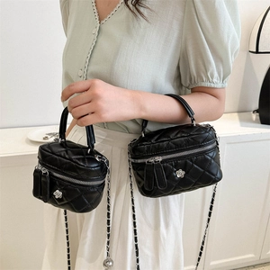 Chic black quilted chain bag set for women with silver floral charm and metal strap