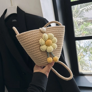 Summer straw crossbody bag in beige with sunflower decor and pearl clasp detail