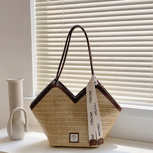 Borsa tote in paglia stile francese con spalline in pelle marrone e dettagli chic