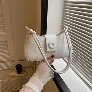 Elegant white PU leather shoulder bag with a unique knot strap and round buckle design