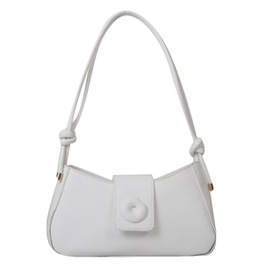 Minimalist creamy white faux leather baguette bag with a knotted shoulder strap detail