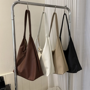 Minimalist PU leather tote bags in four colors with spacious design and wide straps