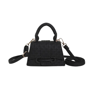 Chic black woven texture trapezoid handbag with gold hardware and removable crossbody strap