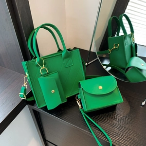 Three-piece quilted green tote bag set with chain shoulder bag and small coin purse charm