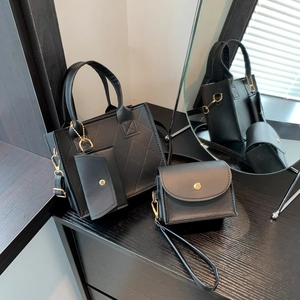 Three-piece black quilted tote bag set with mini pouch and clutch for women's fashion