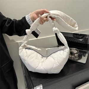 White quilted puffer hobo bag with knotted strap detail for daily office fashion