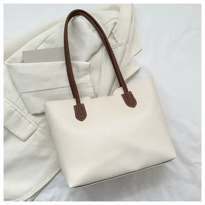Cream white large capacity tote bag with dark brown straps and fine texture