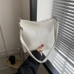 White pebbled leather large shoulder bag with silver hardware and adjustable strap