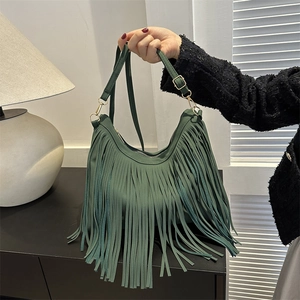 Dark green hobo shoulder bag with long fringes and adjustable strap for women