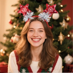 Christmas headband featuring red stars with snowflake patterns and silver tinsel accents