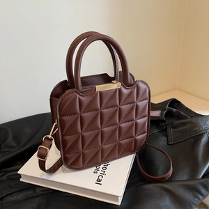Quilted dark brown small square handbag with crossbody strap and golden metal trim