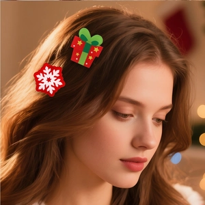 Cute acrylic Christmas reindeer hair clips set for kids party decoration on a girl