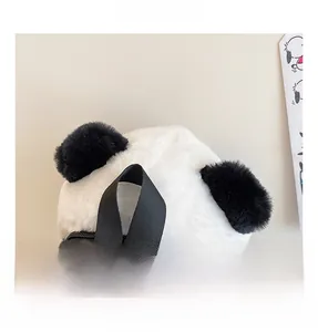 Detail view of plush panda bag showing durable strap, plastic buckles and metal zipper