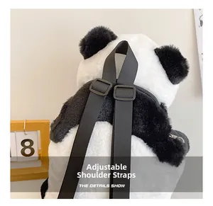 Detail of adjustable black shoulder straps and zipper on panda plush backpack