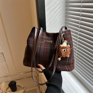 Retro red and green plaid wool bucket tote bag with leather handles and monster charm