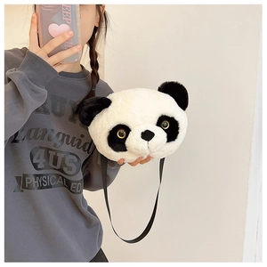 Close-up of plush panda crossbody bag featuring fluffy texture and cute facial details