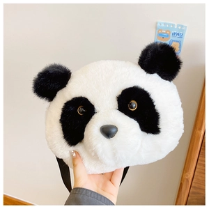 Close-up of fluffy panda head plush shoulder bag with soft faux fur and black strap