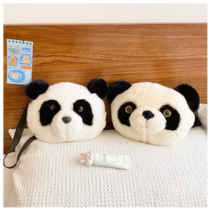 Detail of cute panda plush crossbody bags with soft texture and adjustable black straps