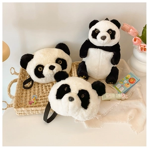 Detail view of cute plush panda shoulder bags and dolls with high-quality soft fur texture