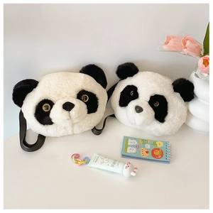 Detail showing two plush panda head crossbody bags with soft texture and fabric straps