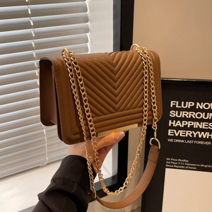 Brown V-quilted leather crossbody bag with golden chain strap and metallic trim details