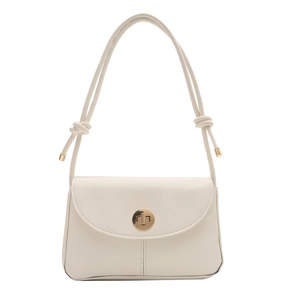 Minimalist cream shoulder bag with golden twist lock and elegant knot strap detail