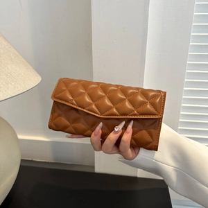 Brown quilted long wallet for women with classic diamond stitching and flap closure
