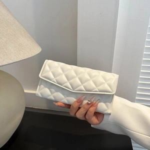 Elegant white quilted long wallet with V-shaped flap closure for women stylish design