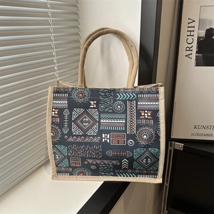 Ethnic pattern tote bag made of natural jute and geometric print fabric with handles
