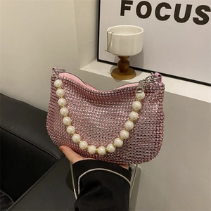 Chic evening bag with pink rhinestones and a white pearl handle for party wear