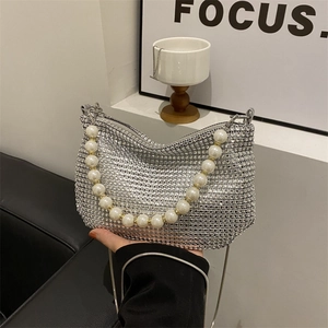 Elegant silver rhinestone hobo bag with pearl handle and metal chain shoulder strap