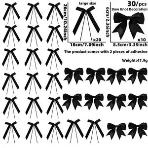 Set of 30 black bow decorations in two sizes for festive party and DIY backdrop hanging