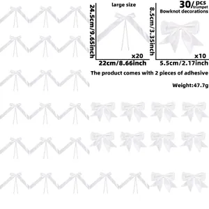 Size chart showing large and small white satin bows for festive party decorations