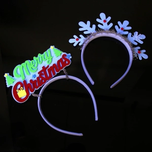 Detail of Christmas headbands with Merry Christmas letters and blue snowflake designs