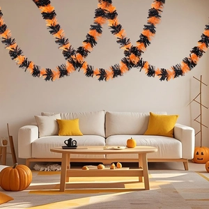 Classic orange and black Halloween garland hanging in waves for festive party decoration