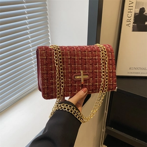 Red tweed chain bag with gold metallic threads and a classic rectangular clasp