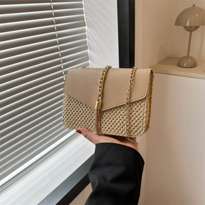 Chic straw woven crossbody bag with khaki leather flap and gold chain strap detail