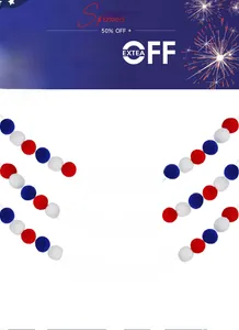 Close-up of red white and blue felt ball garland for Independence Day party home decor